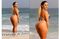 Mulher Melão de fio dental atolado no rabo